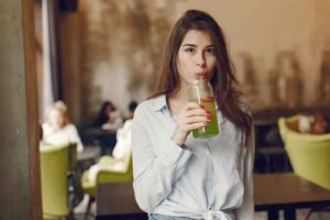 woman-drinking juice - Liquid Collagen